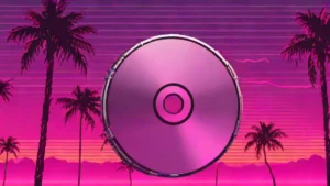 A silver DVD resting on a dark reflective surface with a soft blurred background.