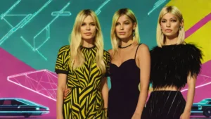 Sienna Miller and her daughter Marlowe Sturridge posing together at a London film premiere event.