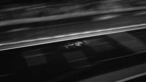 Close-up portrait of Formula 1 driver Kimi Antonelli in his Mercedes racing gear.